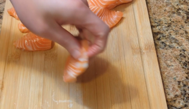 Prepping salmon for nigiri and salmon (block cost $16 and makes about 20 pieces)