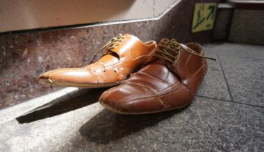 A pair of shoes abandoned on the stairs to an entrance to Ikebukuro Station