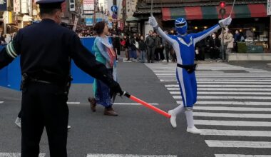 Blue power ranger protesting for the dolphins in Osaka