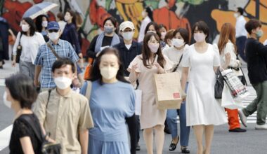 Japan's relaxed mask guidelines not filtering through public