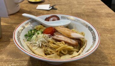 Smoked and soy sauce cured egg yolk on top of mazesoba (mixing ramen) at Menson Rage in Tokyo