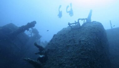 Japan diving shop sorry after customers pose on sunken U.S. warship