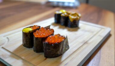 Homemade gunkan sushi (salmon roe and quail egg and uni)