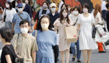 Tokyo raises COVID alert as infections resurge