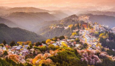 Yoshinoyama, Nara, Japan view of town and cherry trees during the spring season.