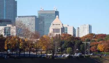 National Diet building rising above the trees. Taken from Sakuradamon at the Imperial Palace.