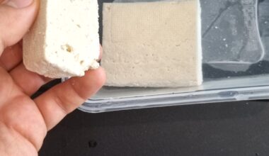 Tofu still looks fine after a few weeks I've opened it, is it still safe to eat if it doesn't feel slimy and doesn't smell bad?