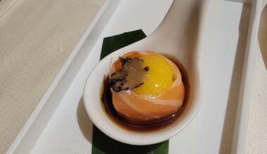 An amazing combo of salmon, quail egg and truffle