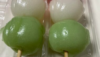 My grandfather bought me a delicious dango for snack >~<