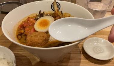 Thick and rich spicy miso curry ramen soup at Menya Tomo in Tokyo