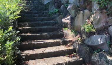 Stone steps to a roadside shrine in the inaka