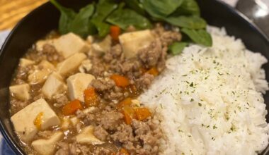 My take on Mapu Tofu. Pork mince, Carrots and with fresh spinach over rice.