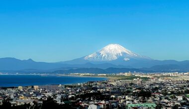 The majestic Mt. Fuji is snow-capped for the first time after a long, hot summer.