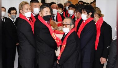 Okada and others attending the Wake of Antoni Inoki