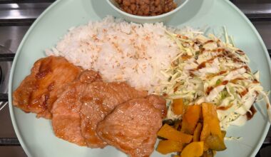 Pork shogayaki for family dinner with natto and pickles