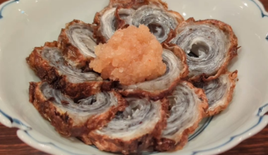 Fish cakes wrapped in snapper skin at a local izakaya in Otsu, Japan