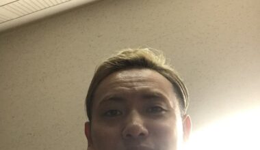 Okada takes a picture on Kevin Knight's phone