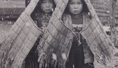 Children wearing straw cape, Japan in 1962 [461x700]