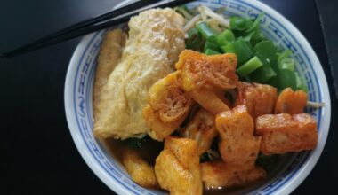 Misosoup with udon noodles, tamgo and some fried tofu