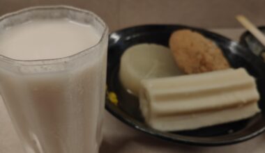 Oden and nigori sake (Japanese sake). Daikon radish, chikuwabu, and ganmo.