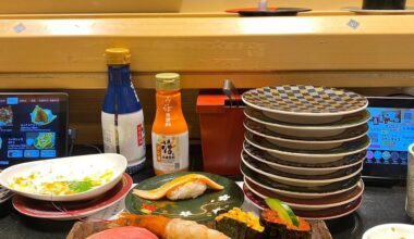 This is a conveyor belt restaurant in Shibuya, Tokyo, these eel and salmon, shrimp, california roll, sea urchin, white fish are delicious