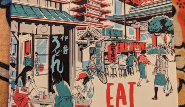 Does anyone know if this specific location of eateries actually exist in Tokyo? I can't even tell if it is the Skytree or the Tokyo Tower in the Background.