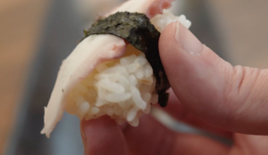 Breaking down an octopus tentacle for Nigiri Sushi