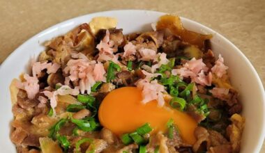 Gyuudon (topped with scallions, yolk, and sushi ginger)