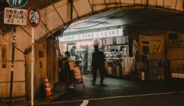 Into The Haze: A Salaryman Enters A Smoke-Filled Yokocho