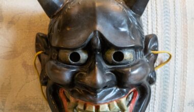 Ceramic(?) hannya mask I found in an antique shop in osaka. Has 紀三井寺 (kimii-dera / kimii temple) marking on the back. Horns had broken off and were glued back on at some point. Unknown age.