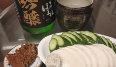 Pickled egg nests of fugu (blowfish), pickled vegetables and sake.After several years of pickling in salted rice bran, the fugu poison is eliminated. The reason is not known.