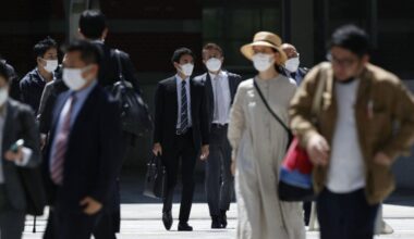 Japan lowers COVID threat level to same as flu in major policy shift