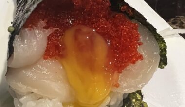 scallop handroll with tobiko and raw quail egg