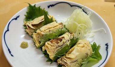 Tamagoyaki with rice underneath (nigiri style) wrap with shiso leaf. Is this considered sushi for you?