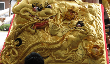 Gold thread embroidery, lions playing with balls and dancing butterflies