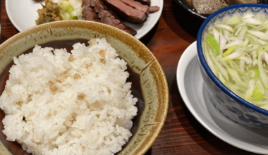 Mouth-watering GYUTAN dish - rice, tail soup, sausage, and beef tongue in Sendai