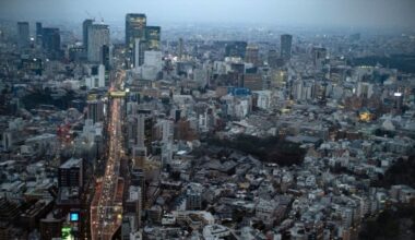 Tokyo inflation speeds up again as Japan production sputters