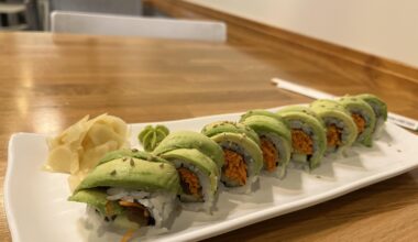 Veggie roll with avocado on top