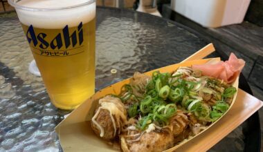 One of the simple joys of life: good beer and takoyaki from Takoyaki Juhachiban in Dotonbori, Osaka.