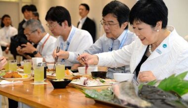 Tokyo’s Koike lunches on sashimi from Fukushima