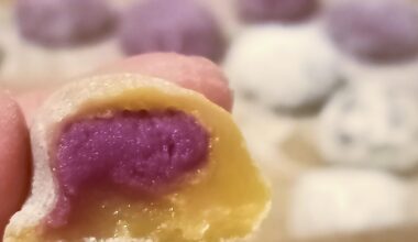 Mango mochi with purple yam paste filling.