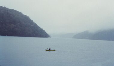 Lone fisherman in Lake Ashi.