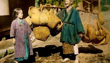 Grandmother and granddaughter selling baskets. Photo and tinting by T. Enami. Japan, 1905-1920 [1706x1251]