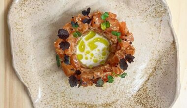Salmon Tartare marinated in Soy, Lime and Ginger with Coconut Milk and Dill Oil