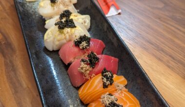 Homemade salmon, tuna, and scallop nigiri with caviar and white truffles