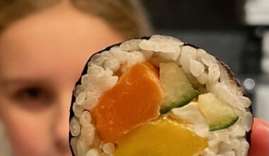 10 yo daughter and I made wonderful western maki. Salmon, cucumber, mango, cream cheese.