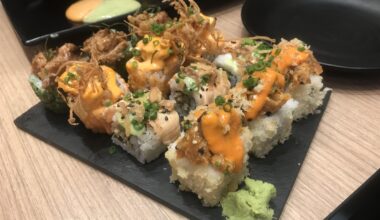 Different kinds of dynamite maki rolls - Truffled steak aburi maki, Ebi tempura maki, Spicy tuna maki, and Salmon skin aburi maki