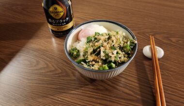 Breakfast of onsen egg, okra, and bonito flakes on rice.