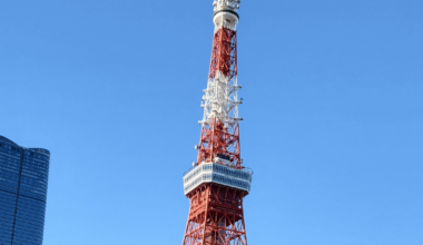 Tokyo tower against a crystal blue sky