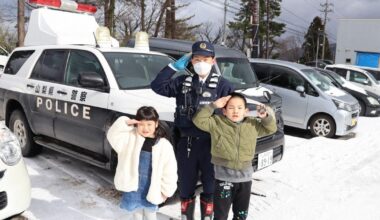 Children at Noto quake shelter get to play cops and robbers in real police car